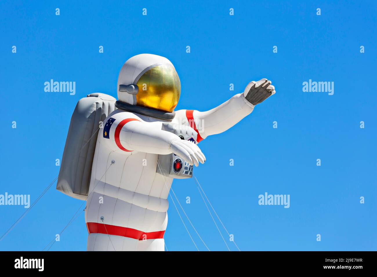 Brisbane Australia /   A large inflatable astronaut above the Brisbane Museum. Stock Photo