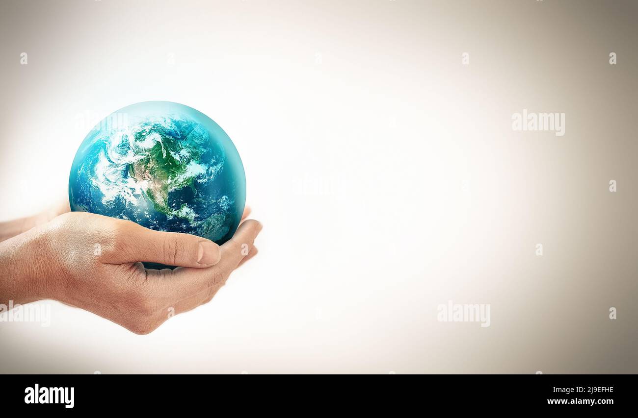 Hands Holding Earth - Conceptual Image Of The Earth Day, Saving Energy, Protecting The Environment. Elements Of This Image Furnished By NASA Stock Photo