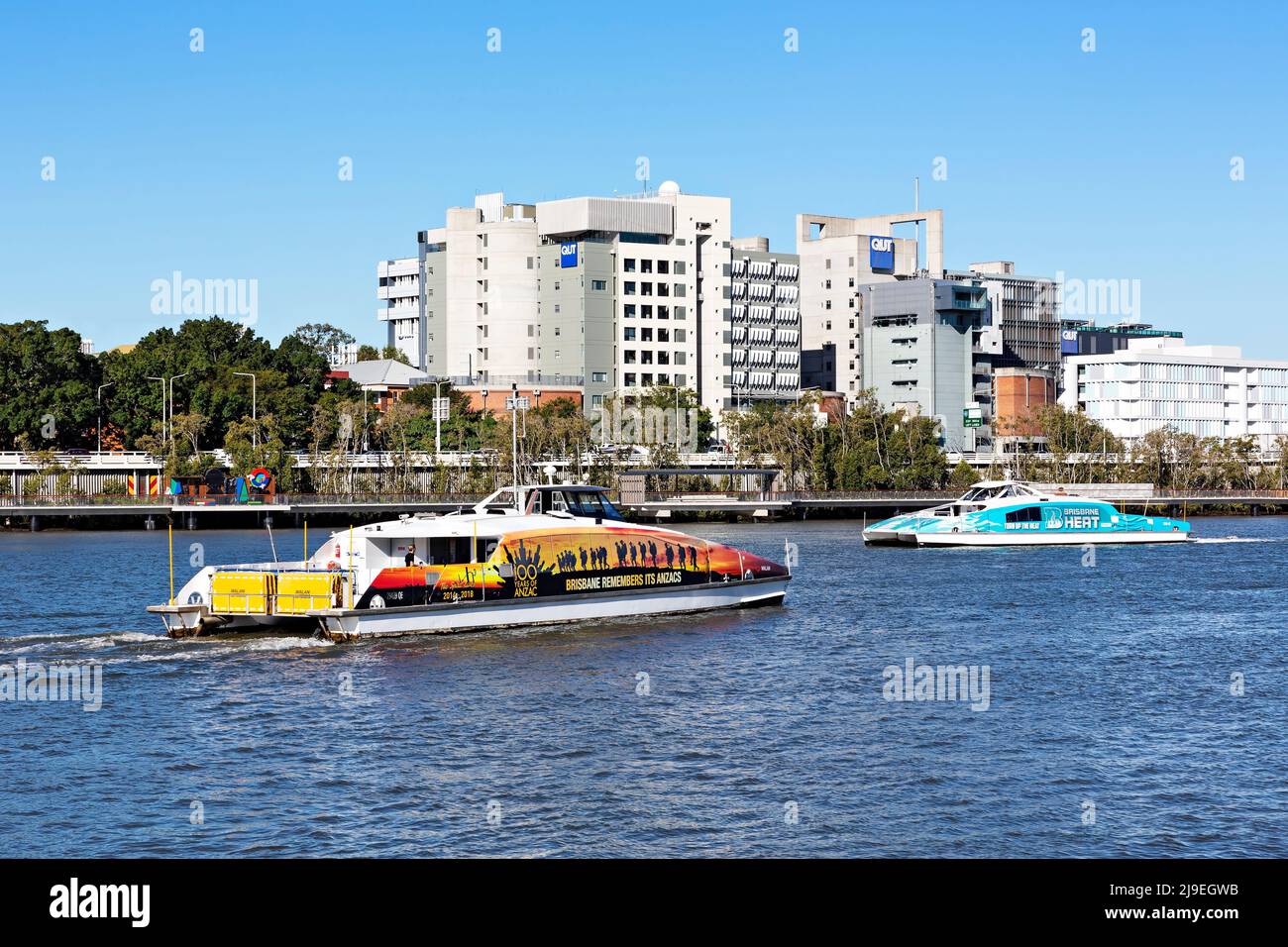 Brisbane Australia /  A fast CityCat Ferries carry passengers along the Brisbane River. Stock Photo