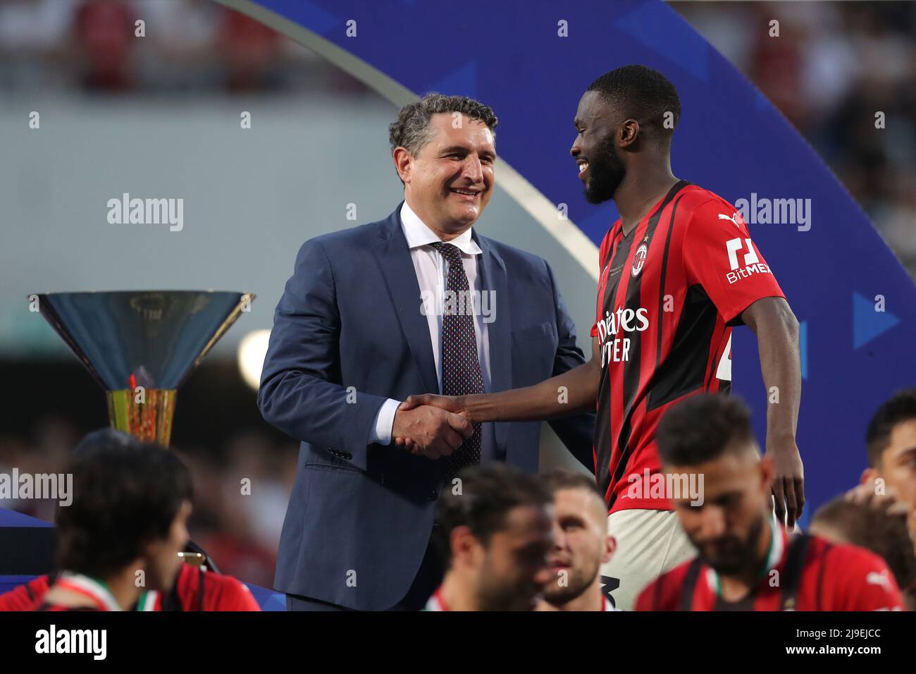 Sassuolo, Italy. 22nd May, 2022. Fikayo Tomori of AC Milan shakes hands with Luigi De Siervo Managing Director of Serie A as he steps onto the podium to receive his winners' medal during the trophy presentation following the Serie A match at Mapei Stadium - Cittˆ del Tricolore, Sassuolo. Picture credit should read: Jonathan Moscrop/Sportimage Credit: Sportimage/Alamy Live News Stock Photo