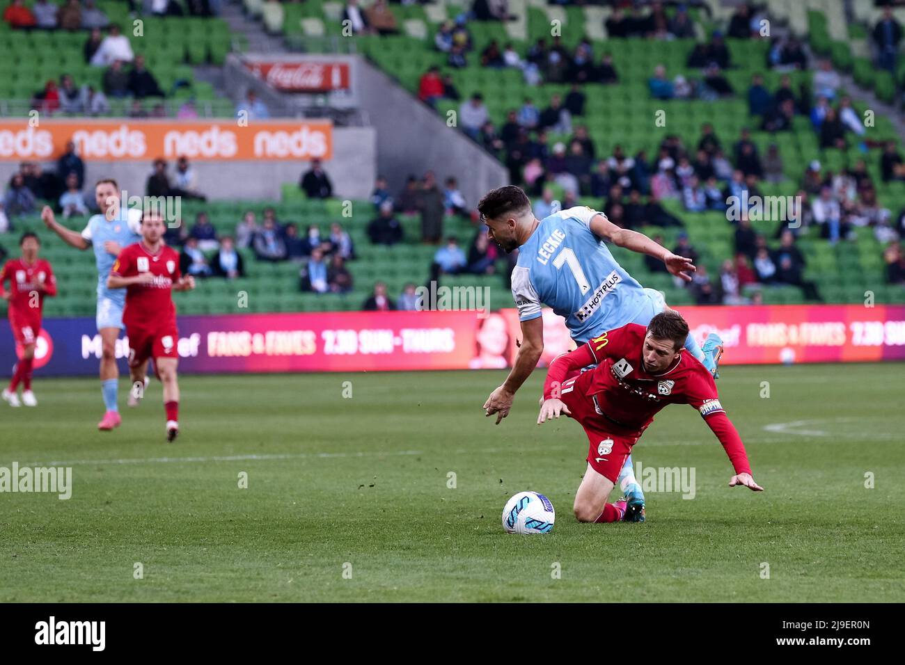 Melbourne, Australia, 22 May, 2022. Mathew Leckie of Melbourne City FC heads the ball but falls over Craig Goodwin of Adelaide United during the A-League Semi Final soccer match between Melbourne City FC and Adelaide United at AAMI Park on May 22, 2022 in Melbourne, Australia. Credit: Dave Hewison/Speed Media/Alamy Live News Stock Photo
