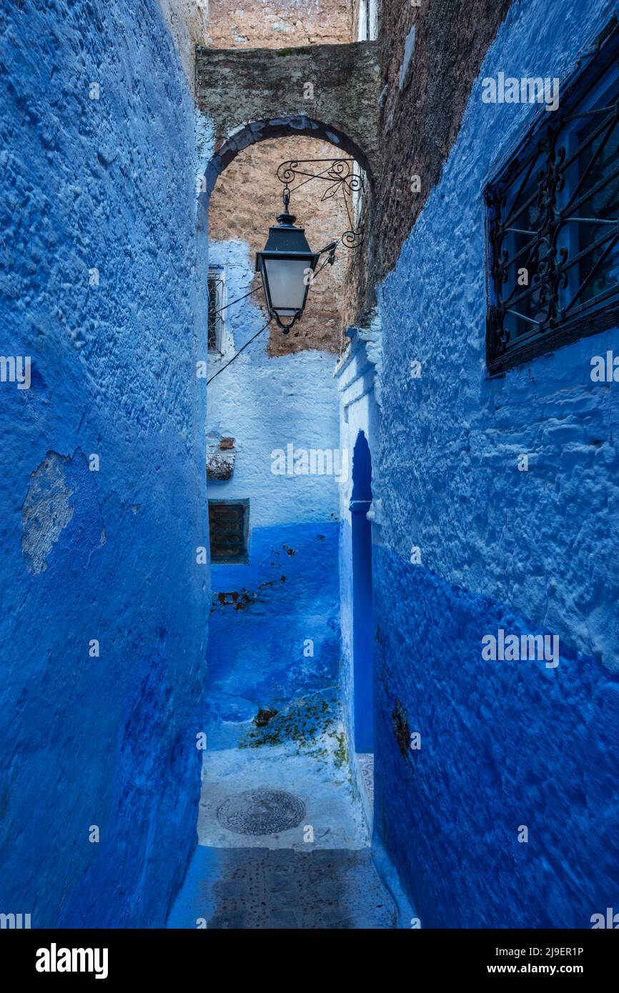 Blue street with lantern in Chefchaouen Stock Photo