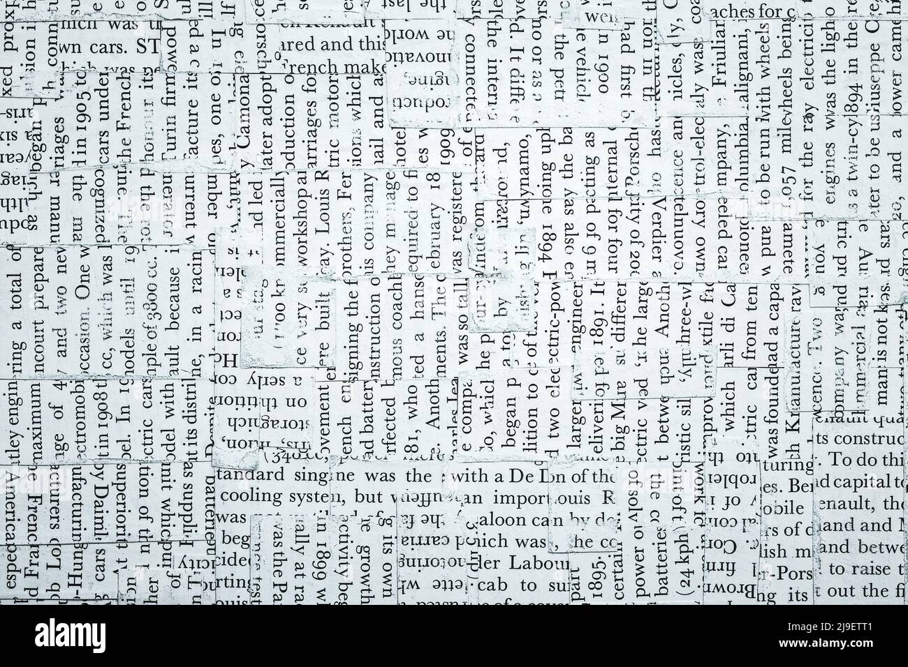 Handmade mixed fonts background made of contemporary newspaper pieces in moody tones. Highly detailed mixed media multilayered abstract design Stock Photo