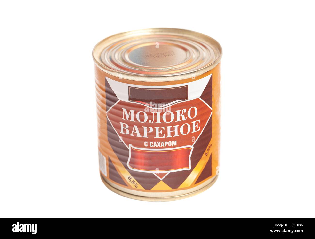 Can of boiled condensed milk isolated on white Stock Photo Alamy