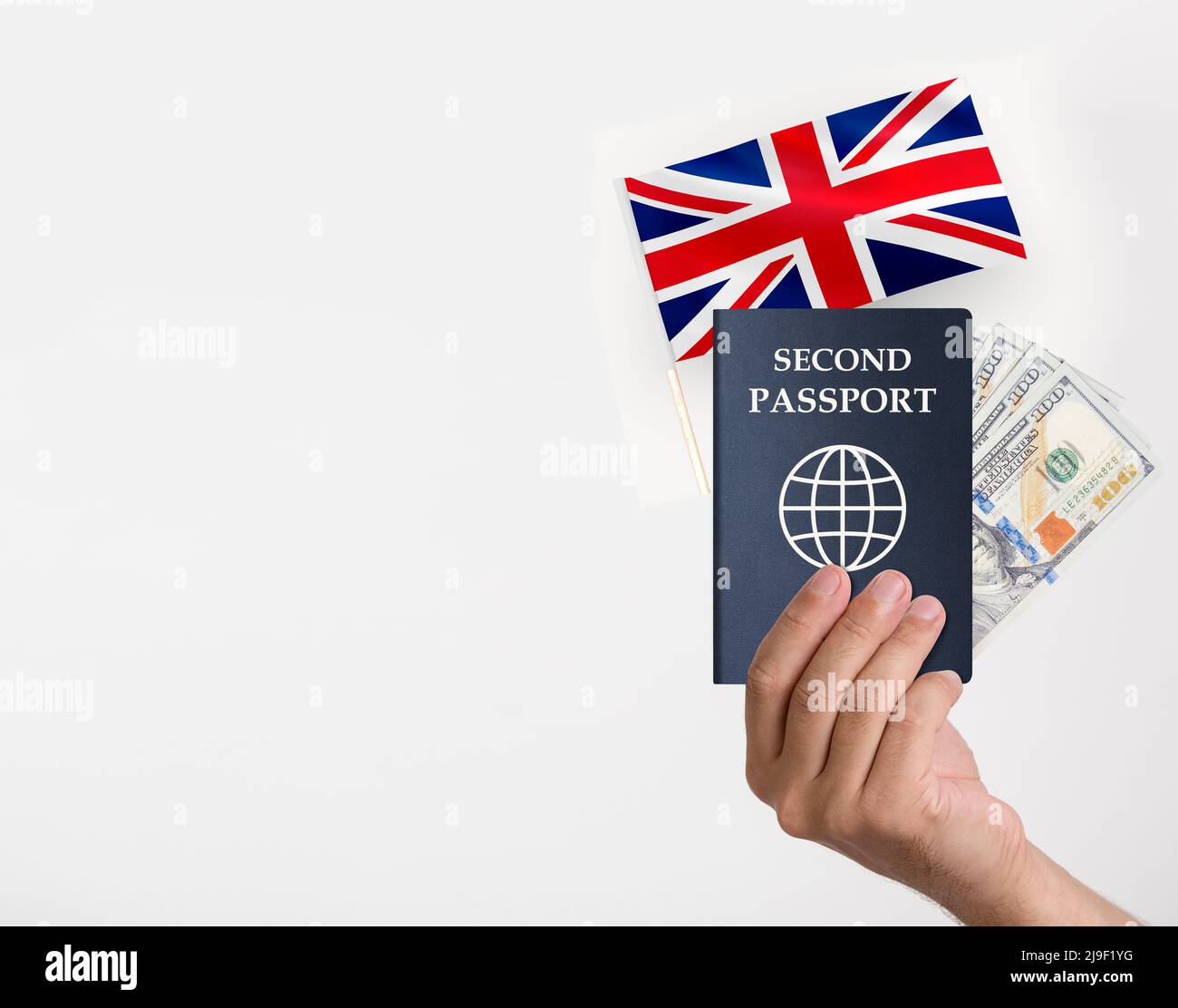 Hand holding a passport and British flag some dollars Stock Photo