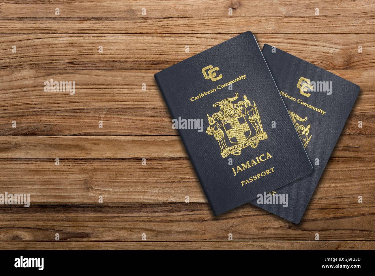 Jamaican passport on a wooden background ,The Jamaican passport is