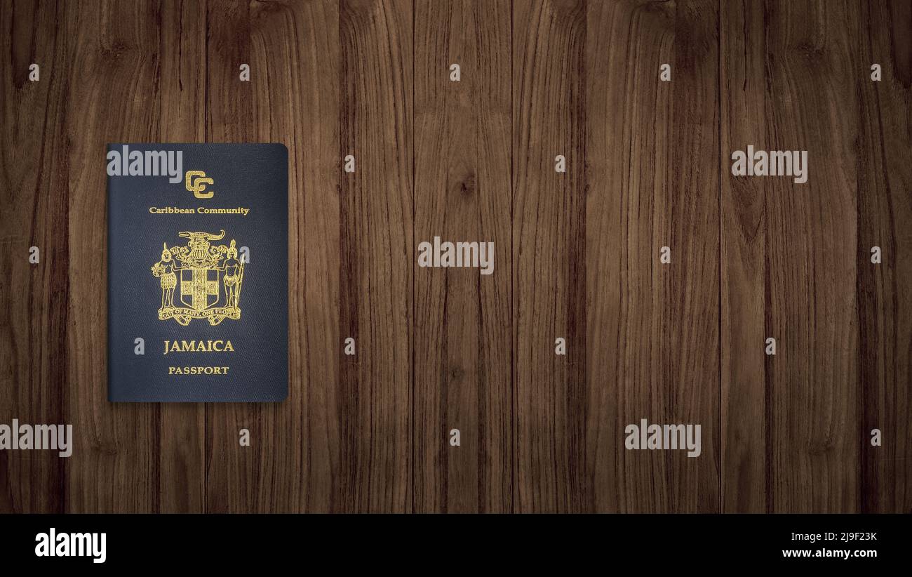 Jamaican passport on a wooden background ,The Jamaican passport is issued to citizens of Jamaica