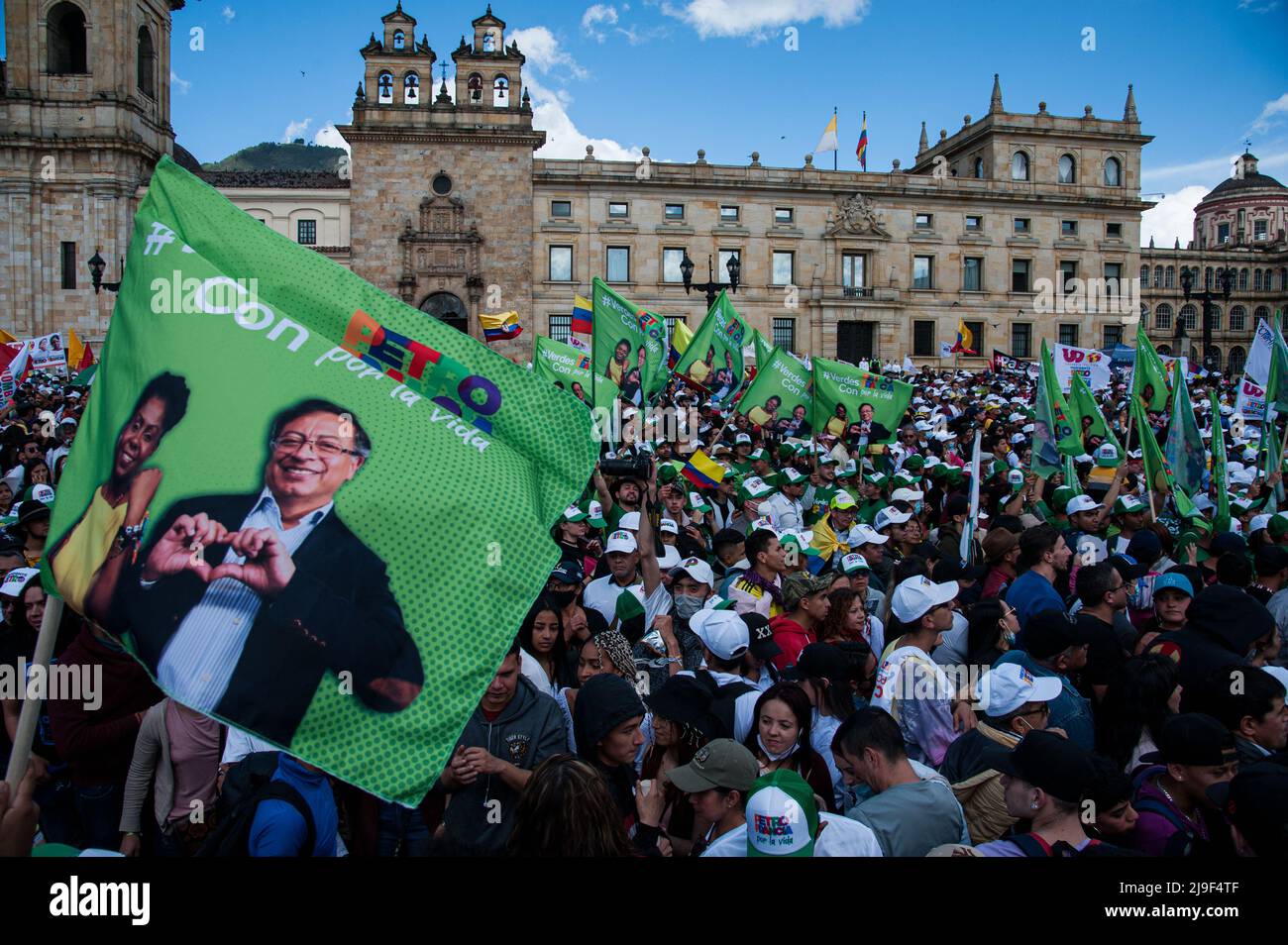 Supporters wave campaign flags during the closing campaign rally of left-wing presidential candidate for the political alliance 'Pacto Historico' Gust Stock Photo