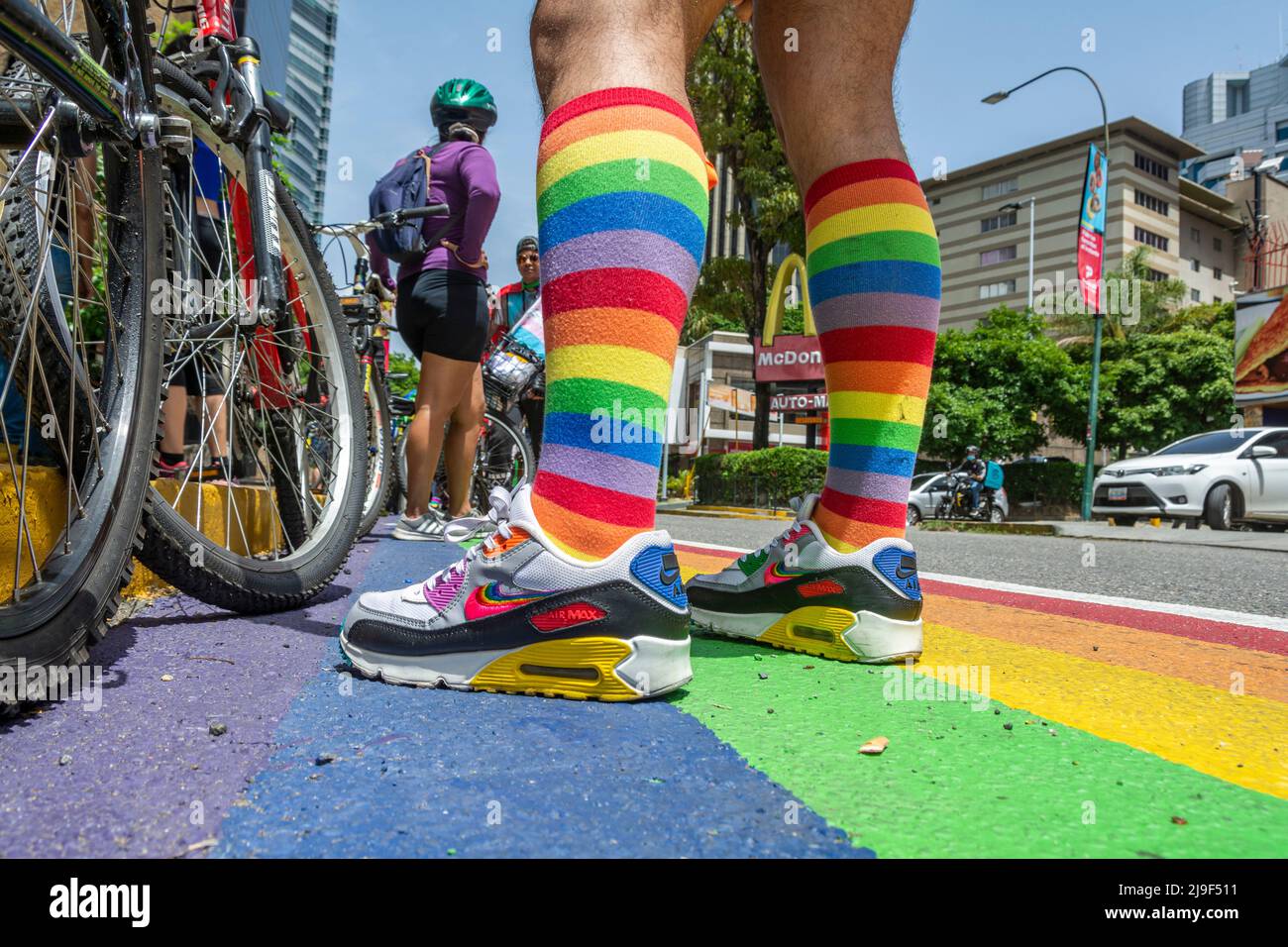 Roll with diversity. Ride a bike for diversity. Bike for respect for diversity on the route of the rainbow flag bike path in Chacao. Caracas, Venezuel Stock Photo