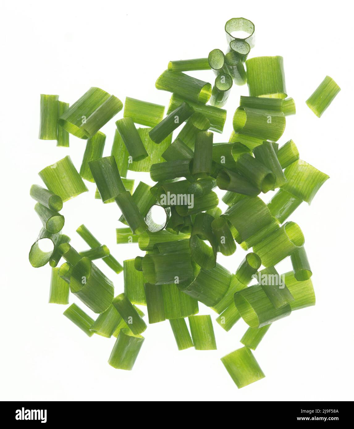 Green chopped onion isolated on white background Stock Photo - Alamy