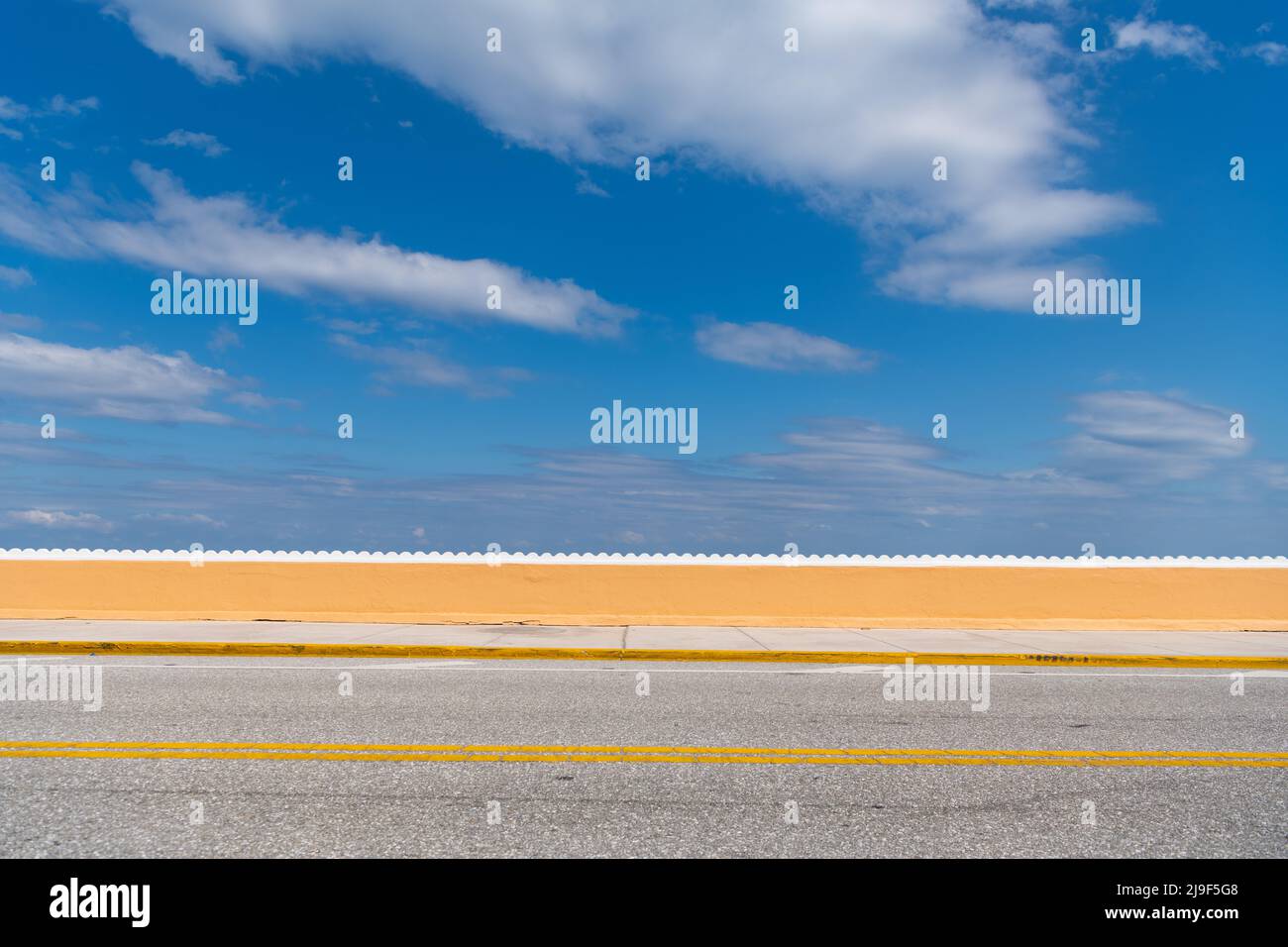 asphalt road with line marking and cloudy sky Stock Photo - Alamy