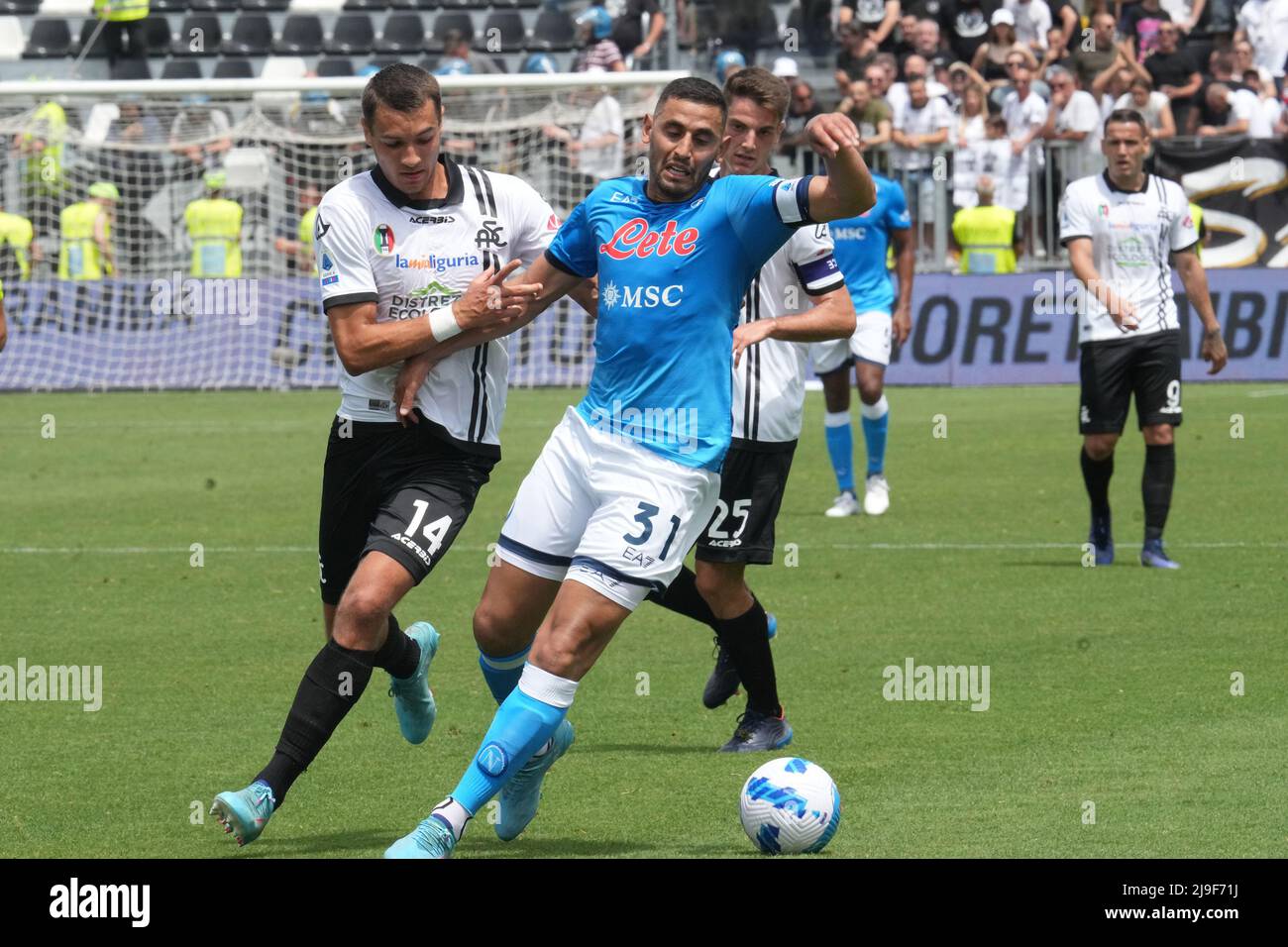 LA SPEZIA, ITALY - MAY 22: Faouzi Ghoulam of SSC Napoli competes for the ball with Jakub Kiwior of Spezia Calcio ,during the Serie A match between Spezia Calcio and SSC Napoli at Stadio Alberto Picco on May 22, 2022 in La Spezia, Italy. (Photo by MB Media) Stock Photo