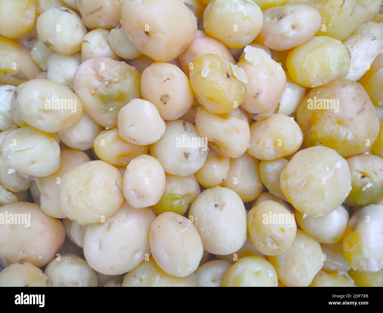 Boiled and peeled off potatoes Stock Photo
