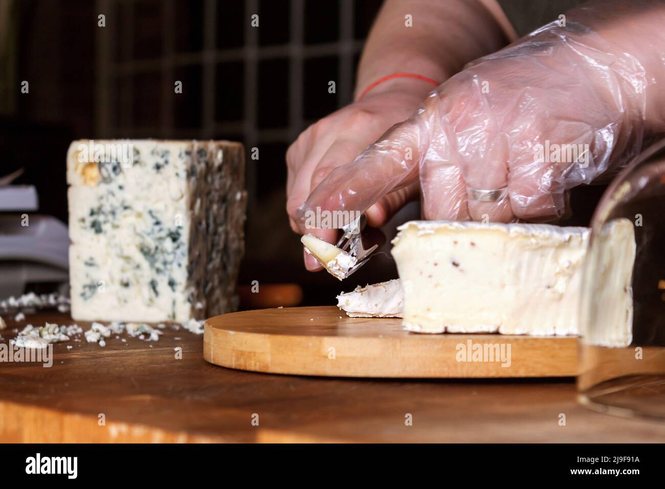 Cheese shop. Roquefort. Selective focus. Close up. Stock Photo