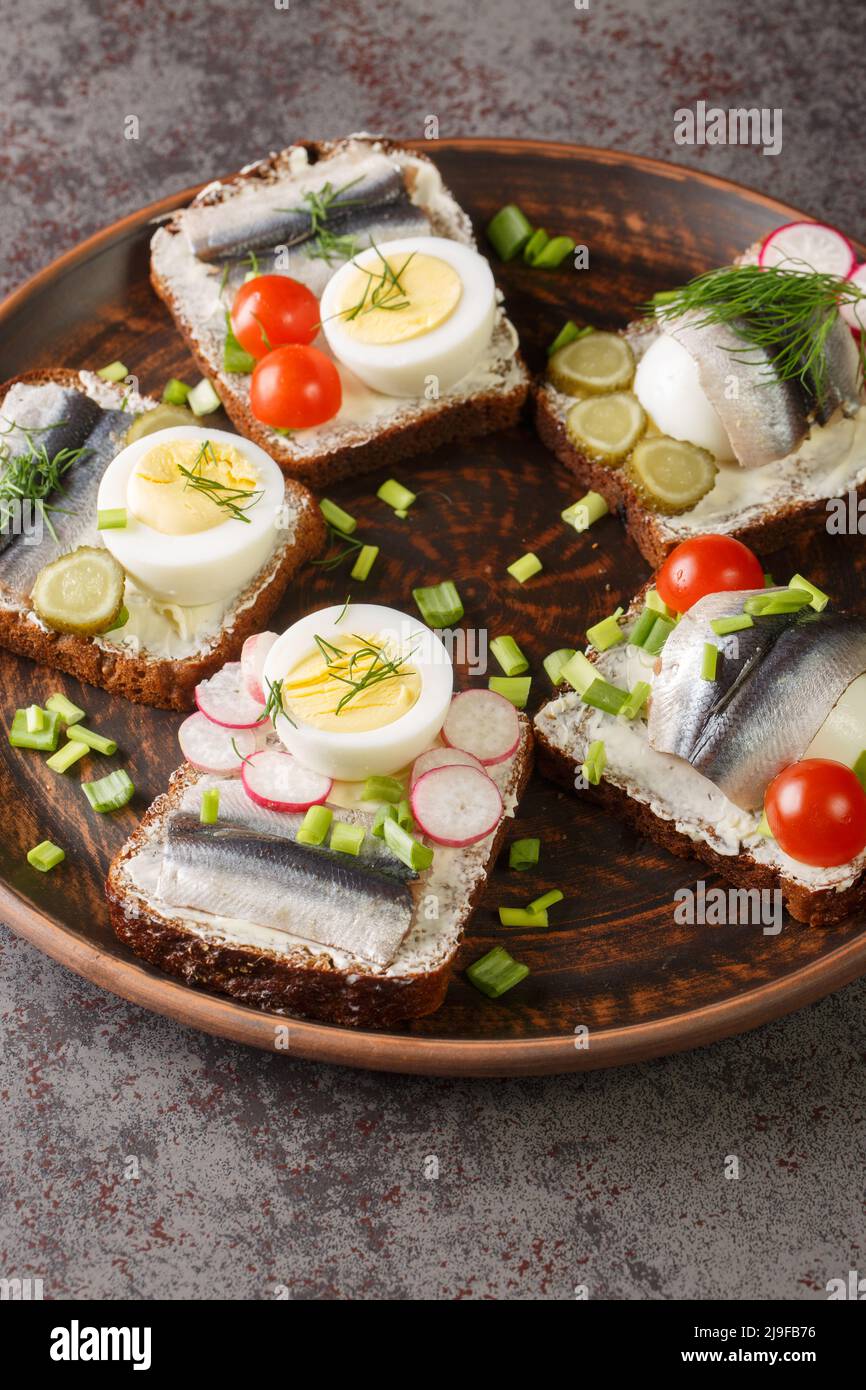 Kiluvoileib Estonian open sandwich consists of a slice of rye bread