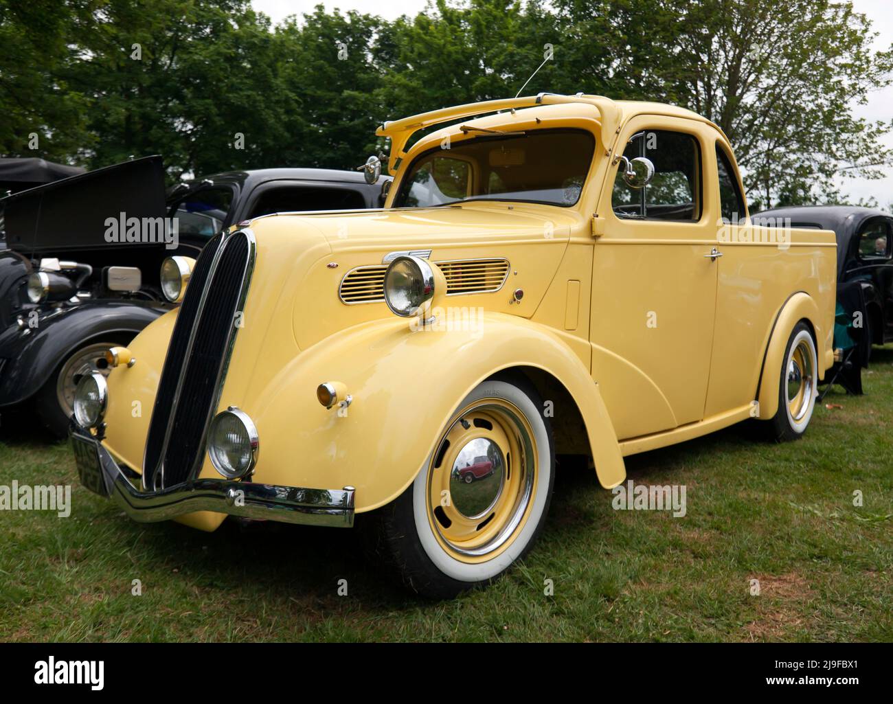 A  spectacular, yellow,  hot-rod, based on a  1950,  Ford Popular 103E Coupe Utility,  on display at the Wickhambreaux Classic Car Show, 2022 Stock Photo