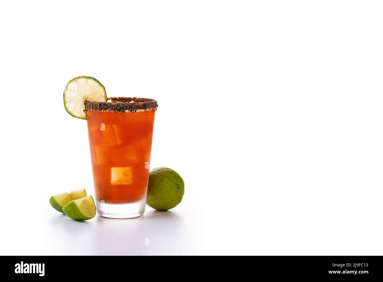 Homemade michelada cocktail with beer salted Rim and tomato juice ...