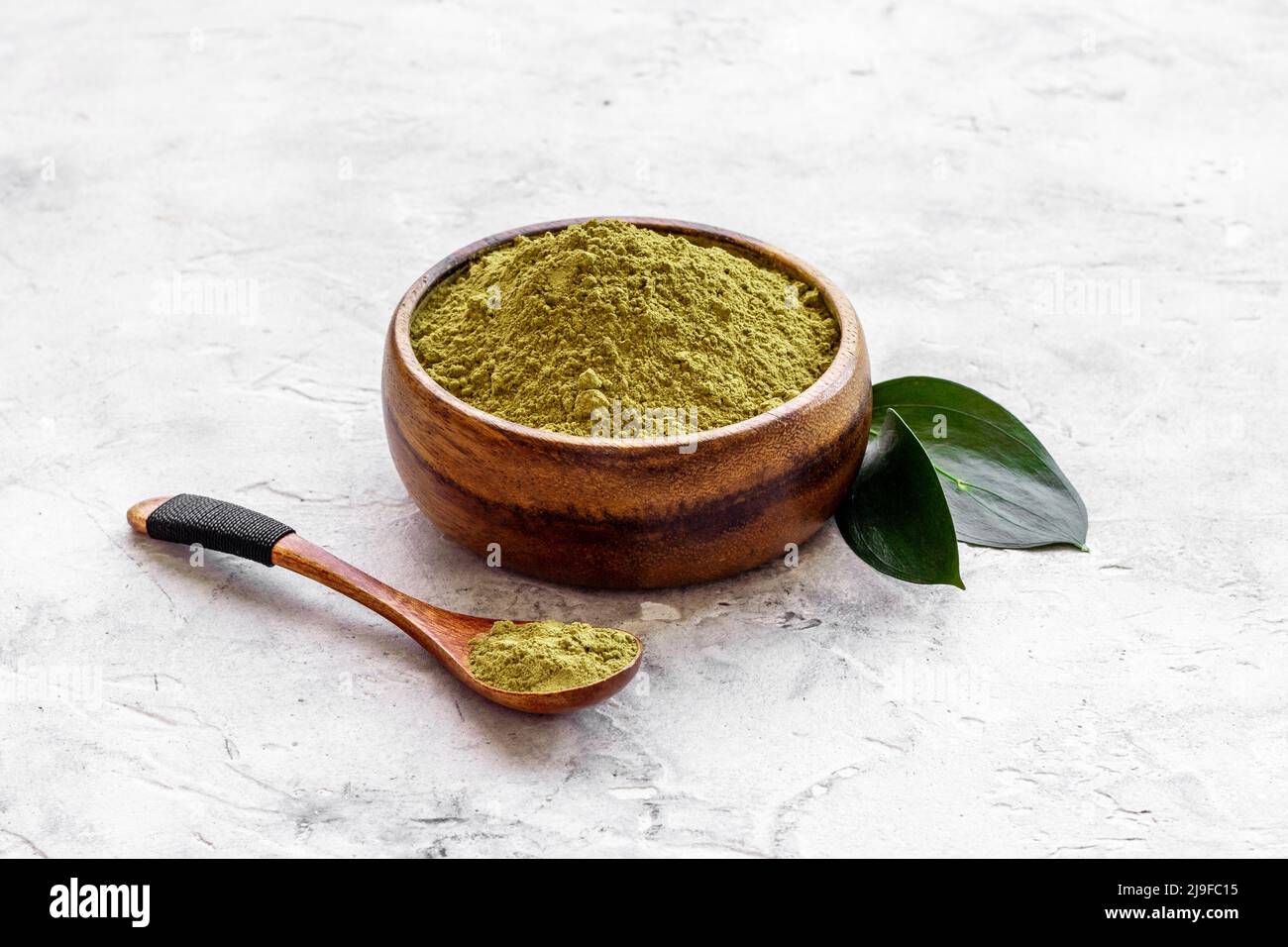 Matcha tea powder with green leaf. Asian beverage concept Stock Photo