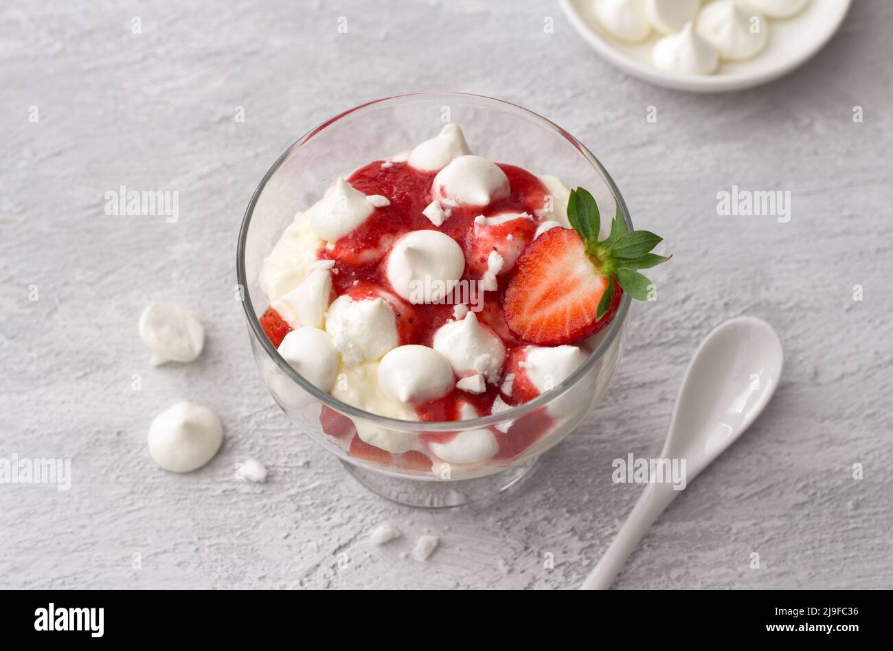 Eton mess, traditional English dessert, strawberry with cream, meringue