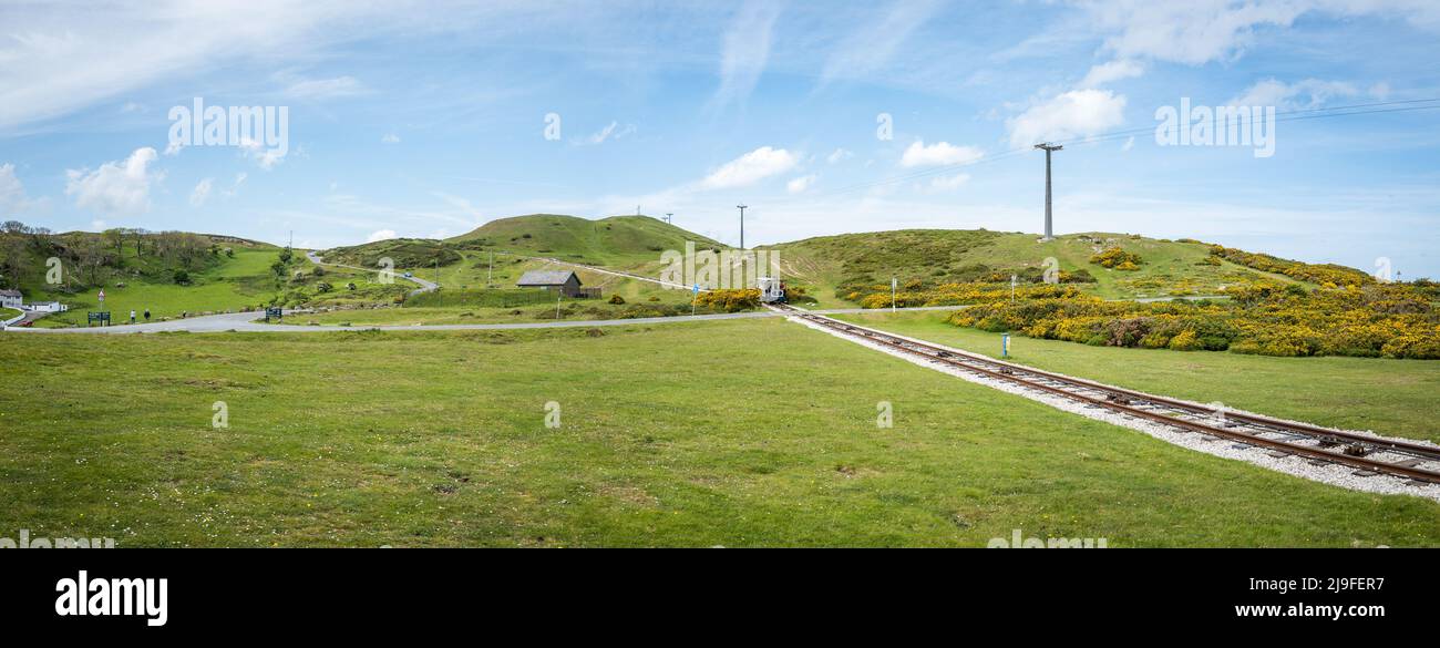 Wire rope operated victorians trams taking tourists to the top of the great Orme, Llandudno, Wales using the Great Orme Tramway, Stock Photo