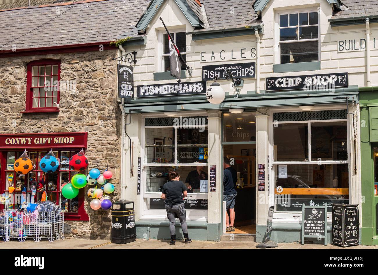 Fishermans Chip shop. A local fish and chip shop open in the coastal Welsh town of Conwy, wales. Stock Photo