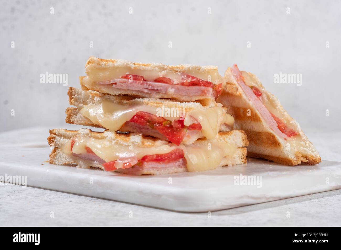 grilled ham, cheese and tomato sandwich Stock Photo
