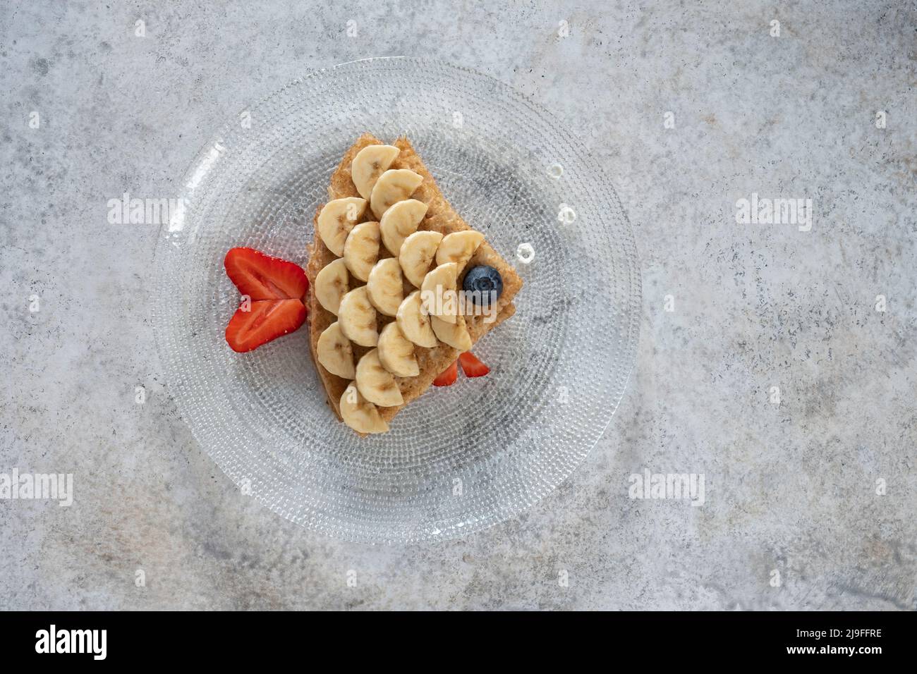Funny crepes pancakes looks like a fish Stock Photo Alamy