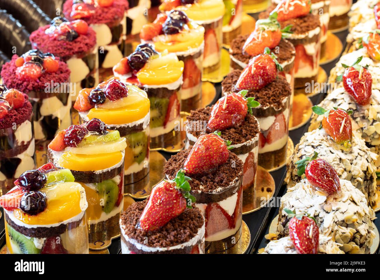 Types of cakes. Cakes on display at the patisserie counter. close up