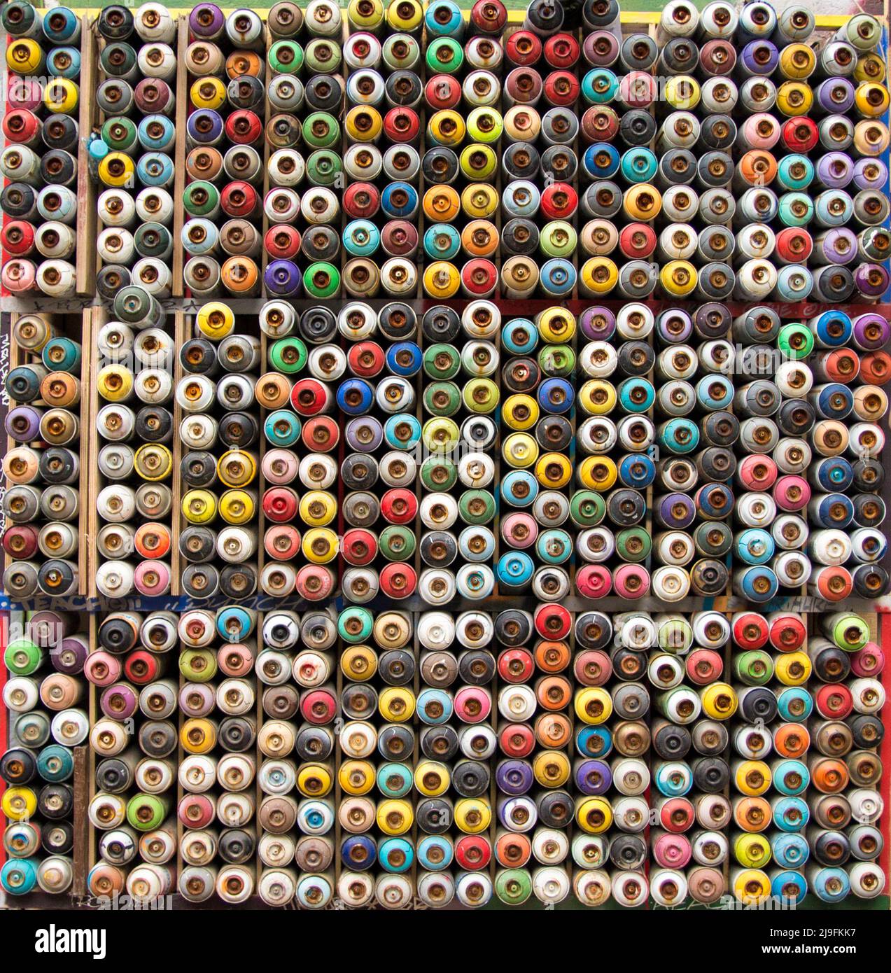 Paint cans, reverse shot, colorful spray paint cans, colorful wall