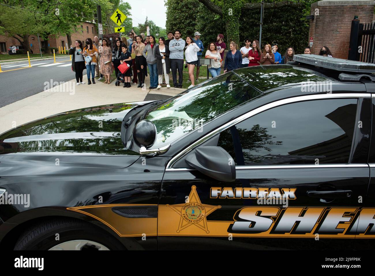 Fairfax County Sheriffs Deputies provide crowd control for the departures of Amber Heard and Johnny Deep from the Fairfax County Courthouse, in Fairfax, at the close of another day in his civil trial with Amber Heard, Thursday, May 5, 2022. Depp brought a defamation lawsuit against his former wife, actress Amber Heard, after she wrote an op-ed in The Washington Post in 2018 that, without naming Depp, accused him of domestic abuse. Credit: Cliff Owen/CNP (RESTRICTION: NO New York or New Jersey Newspapers or newspapers within a 75 mile radius of New York City) Stock Photo
