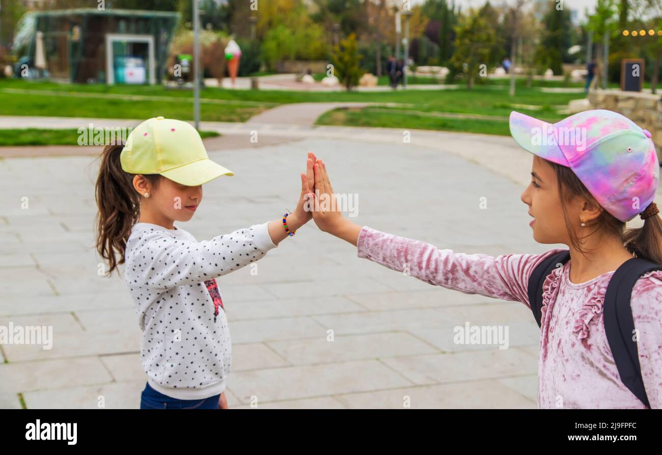 children holding hands in the park.selective focus.kids Stock Photo - Alamy