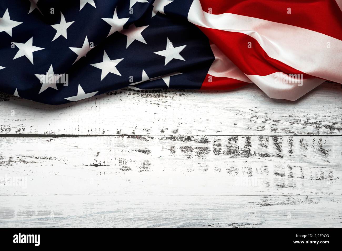 Happy Independence day July 4th. American flag with space for text on white wooden rustic background. Celebrating Independence Day concept Stock Photo
