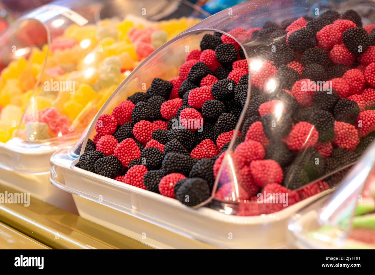 Chewy, gelatin sweets on the counter of a candy store Stock Photo Alamy