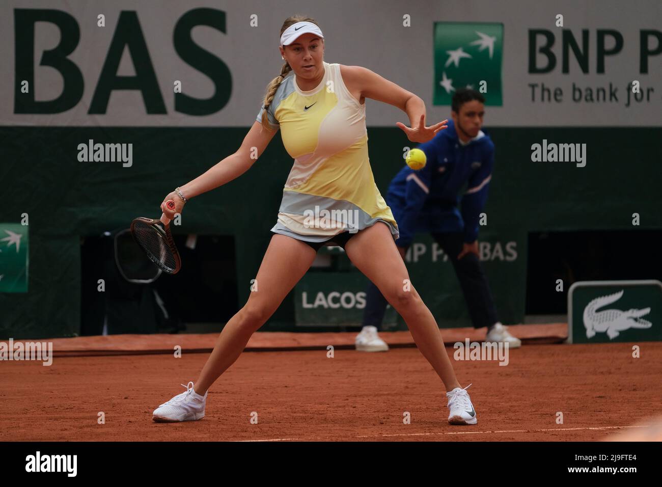 Paris, France. 23rd May, 2022. AMANDA ANISIMOVA of USA return the ball  to.NAOMI OSAKA of Japan during the first round at the French Open 2022,  women's grand slam tennis tournament at the