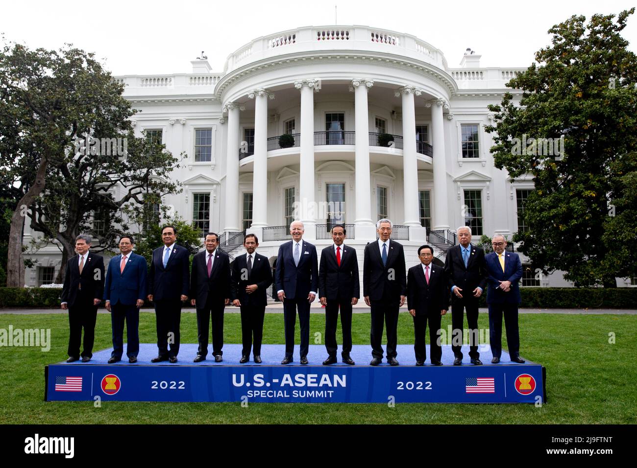 US President Joe Biden (C) poses with leaders of the US-ASEAN Special Summit during a family photo on the South Lawn of the White House in Washington, DC, USA, 12 March 2022. Also in this picture (L to R); Dato Lim Jock Hoi, Secretary-General of the Association for Southeast Asian Nations; Prime Minister of Vietnam Pham Minh Chinh; Prime Minister of Thailand Prayut Chan-o-cha; Prime Minister of Cambodia Hun Sen; Sultan Haji Hassanal Bolkiah of Brunei; President of Indonesia Joko Widodo; Prime Minister of the Republic of Singapore Lee Hsien Loong; Prime Minister of the Lao People's Democratic R Stock Photo