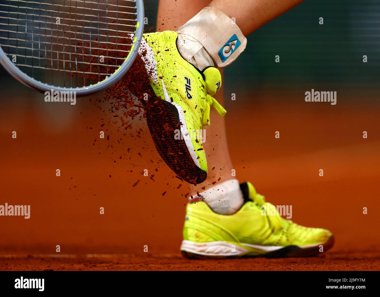 Tennis - French Open - Roland Garros, Paris, France - May 23, 2022 Czech  Republic's Barbora Krejcikova removes the