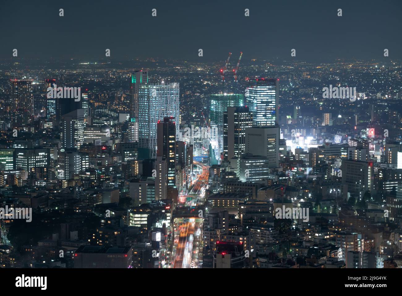 The streets of Tokyo Japan at Night Stock Photo