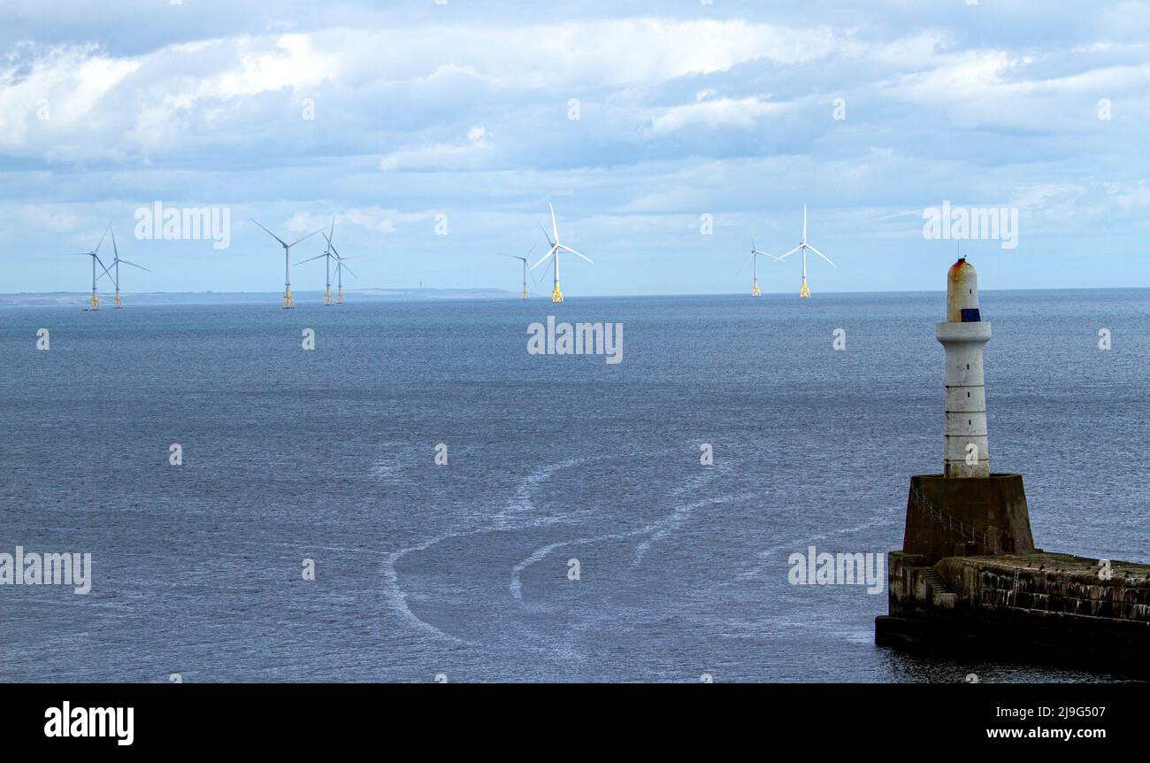 Landscape view of the offshore wind farm turbines which are located approximately 3 kilometres off the coast of Aberdeen in Scotland Stock Photo