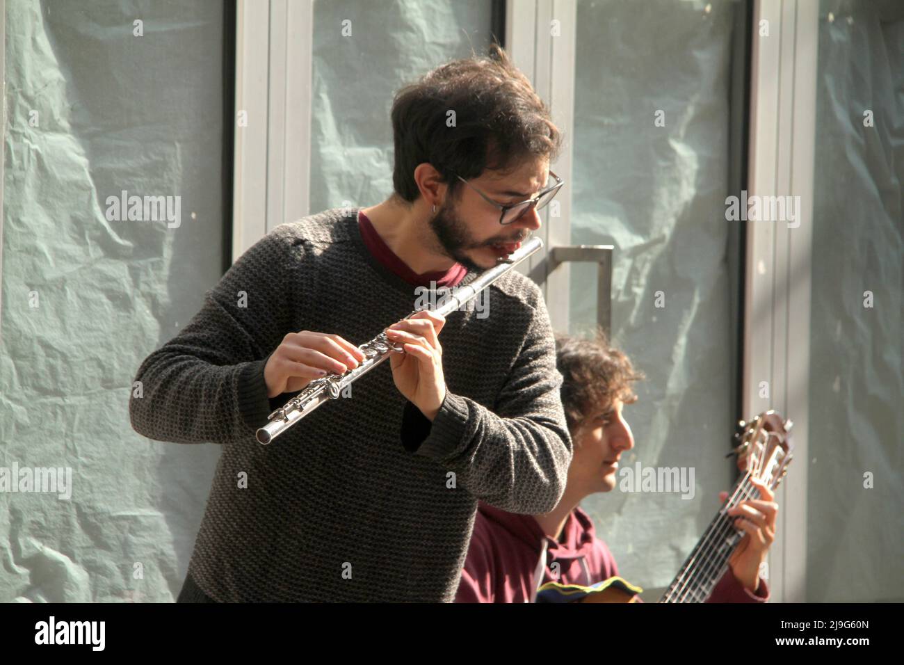 Young musicians on a street in Italy Stock Photo