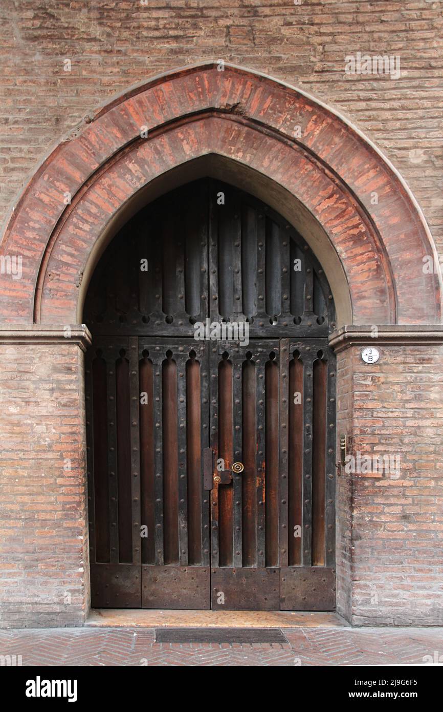 Medieval style door in the historic center of Bologna, Italy. Stock Photo