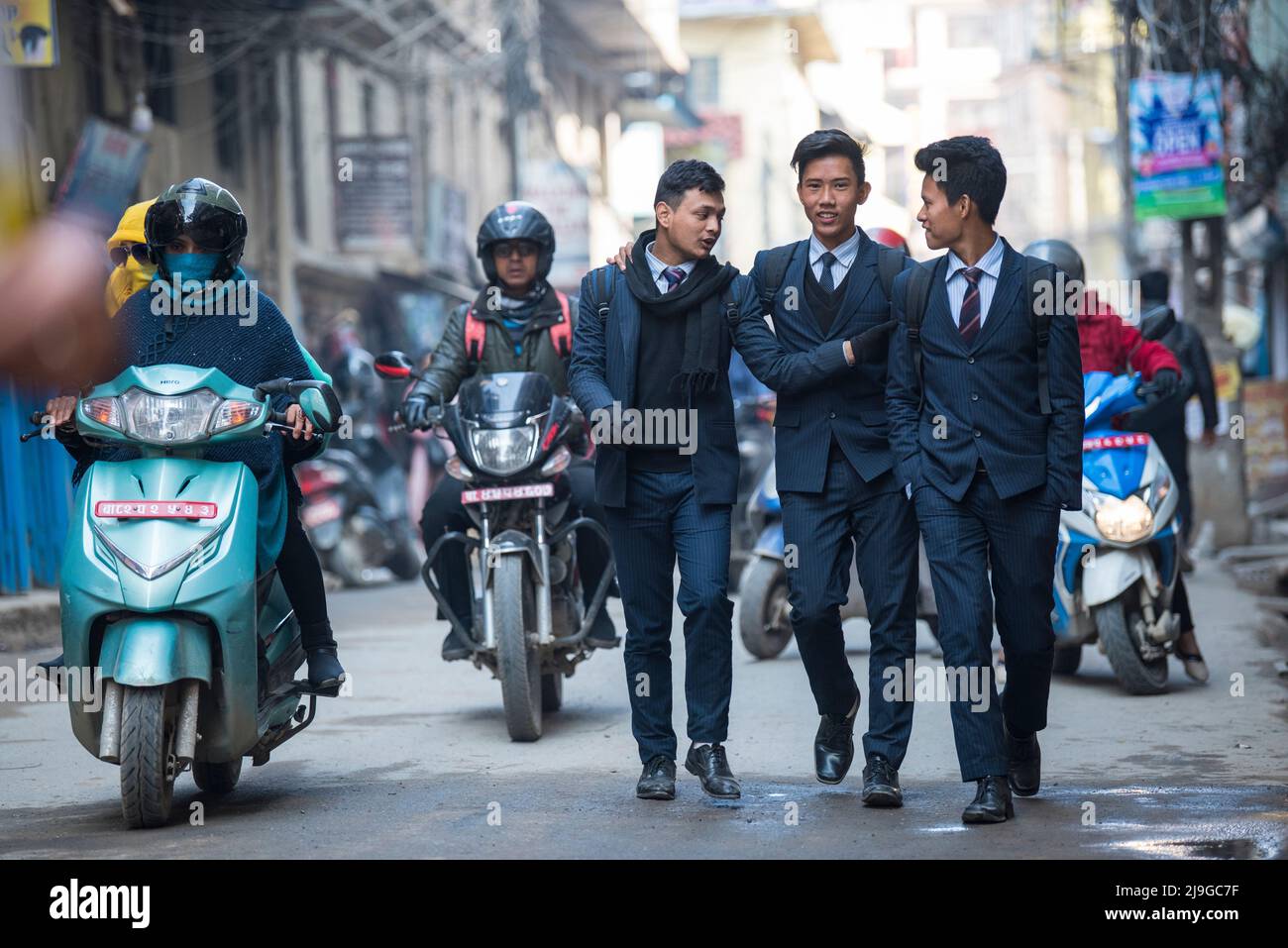 Kathmandu, Nepal- April 20,2022 : High school students dressed in school uniforms on the streets of Kathmandu. Stock Photo