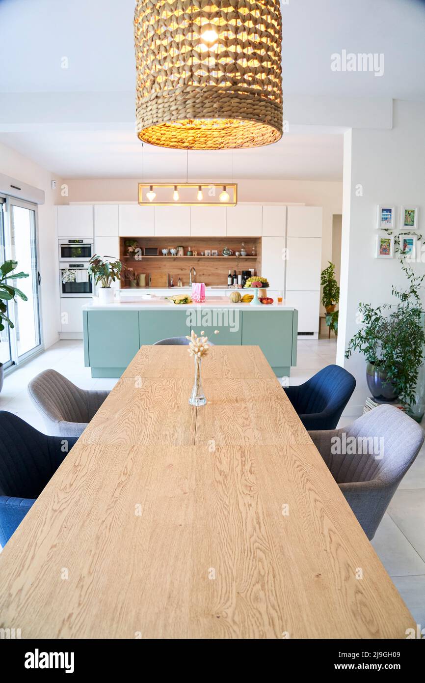 Dining table in domestic kitchen Stock Photo