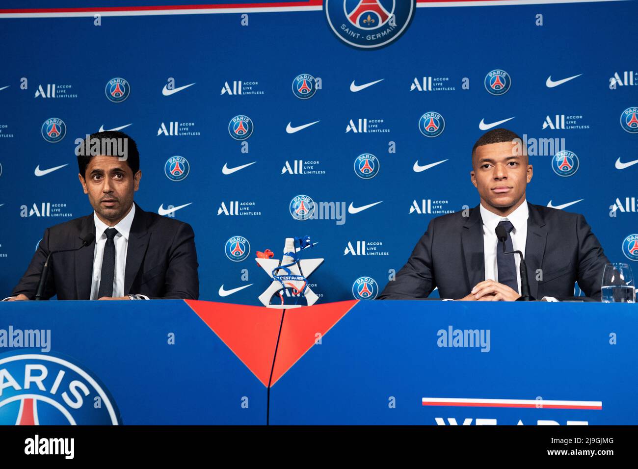 PSG striker Kylian Mbappe shows his jersey with PSG president Nasser  Al-Khelaifi during a press conference Monday, May 23, 2022 at the Paris des  Princes stadium in Paris. Kylian Mbappé's decision to