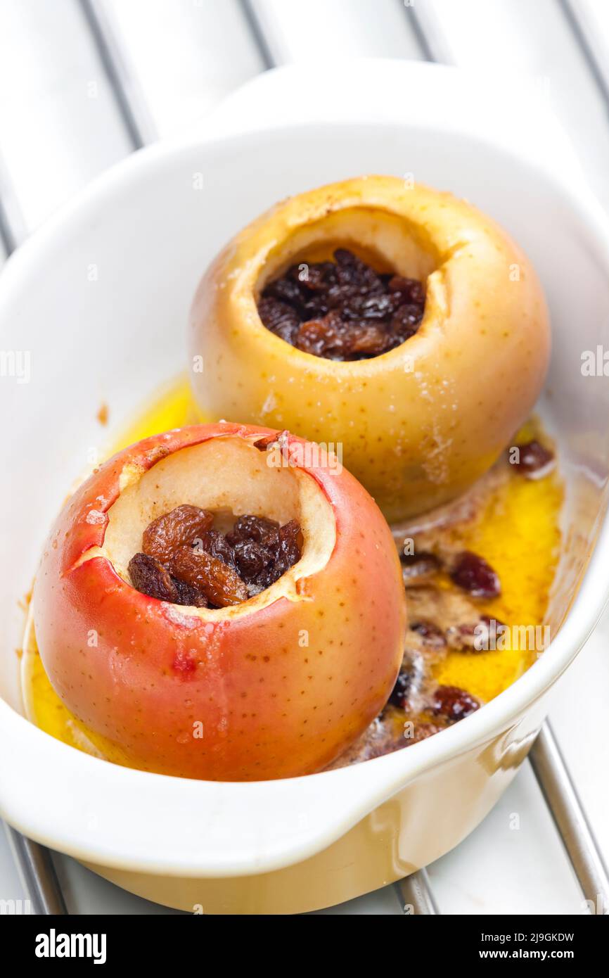 sweet apples baked with raisins Stock Photo - Alamy