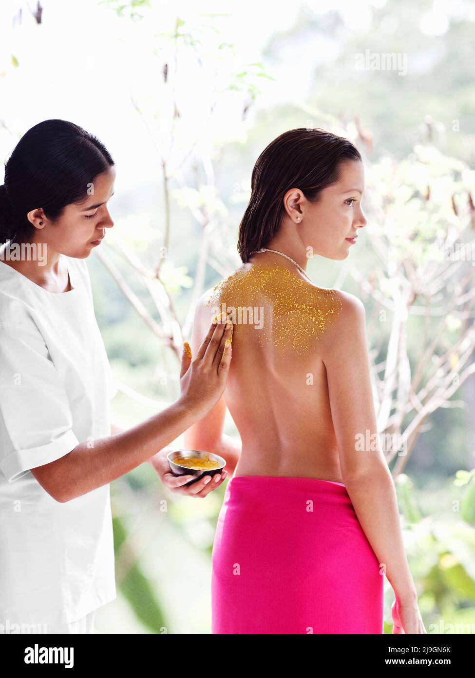 Woman receiving organic scrub hi-res stock photography and images - Alamy