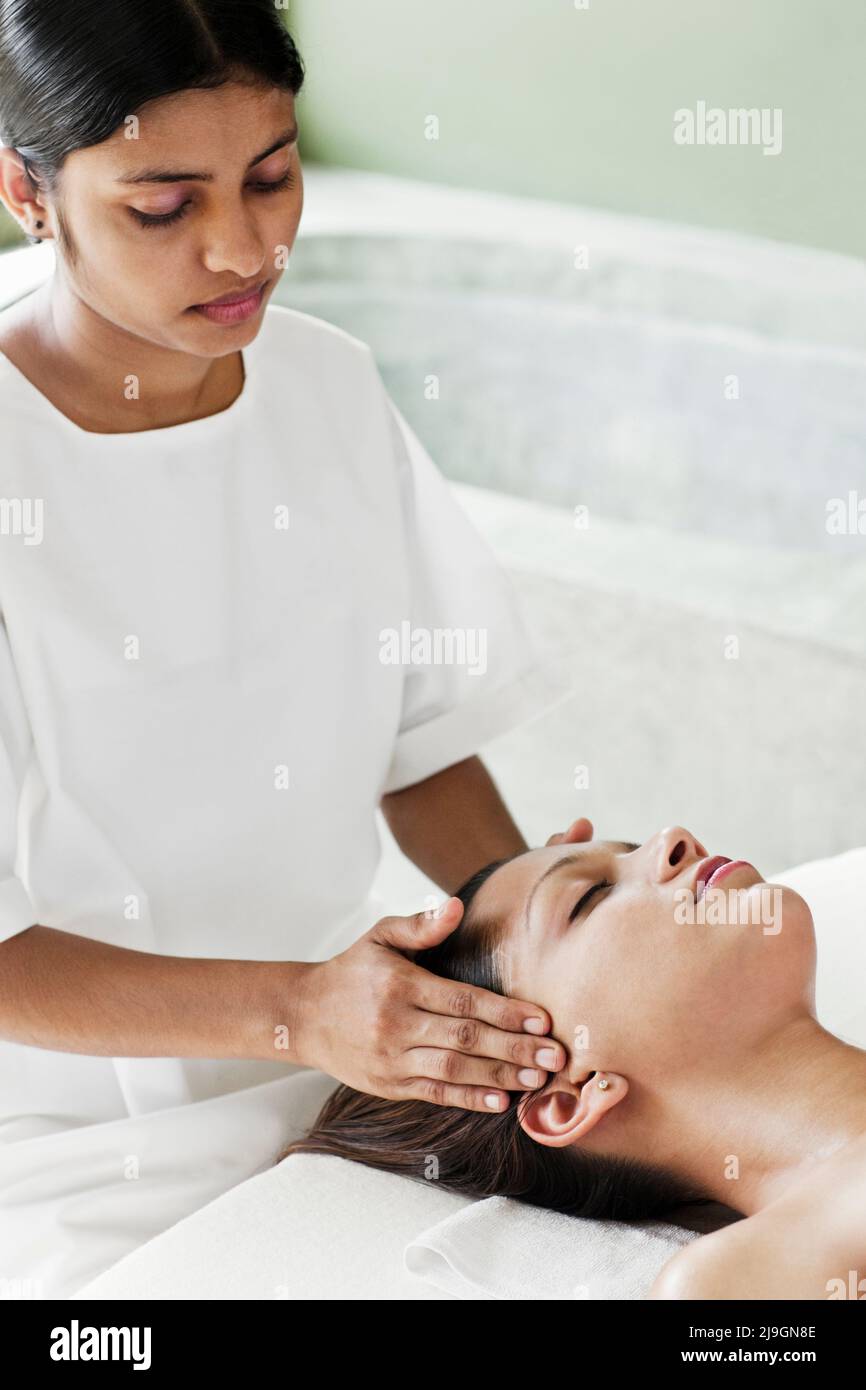 Woman Receiving Facial at Six Senses Spa, Heritance Kandalama, Dambulla, Sri Lanka. Stock Photo