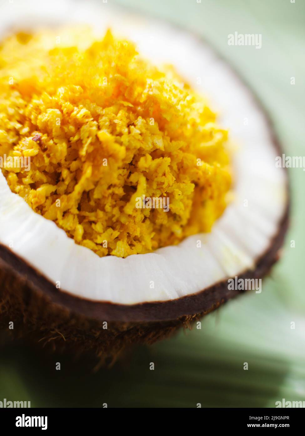 Raw Spa Ingredients. The coconut scrub is applied directly in a rubbing motion to exfoliate and smoothen the skin. Palakkad, Kerala, India Stock Photo
