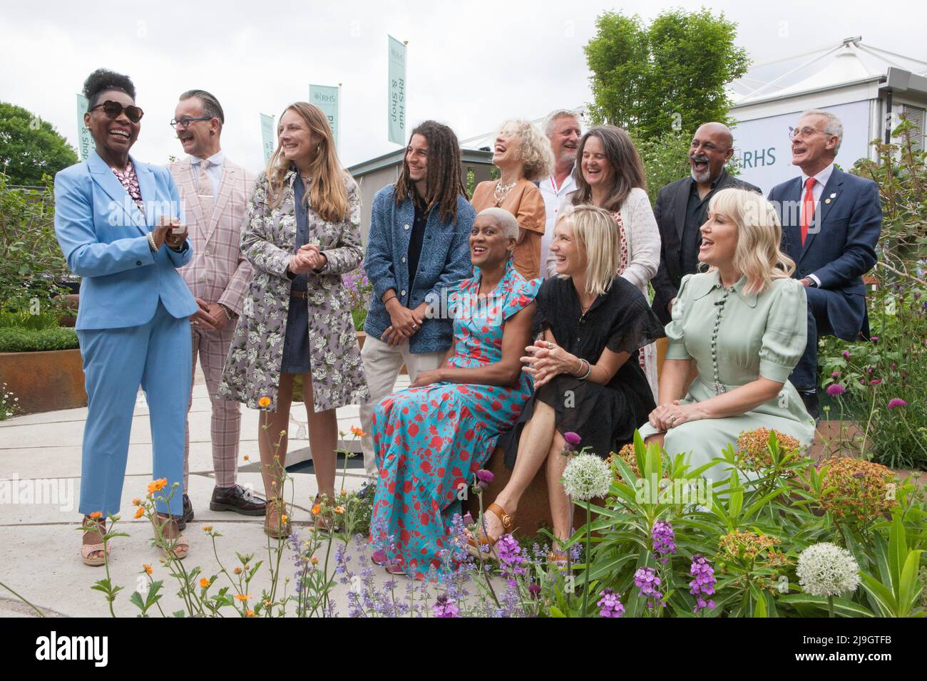 London, UK, 23 May 2022: Outgoing RHS ambassador Flowella BNenjamin, left, addresses the ten new ambassadors announced at Chelsea Flower Show, including Simon Lycett, Kate Bradbury, Tayshan Hayden Smith, Sue Kent, Mark Gregory, incoming RHS president Clare Matterson, Manoj Malde, James Alexander-Sinclair and seated Arit Anderson,  Jo Wiley and Nicki Chapman.  Anna Watson/Alamy Live News Stock Photo