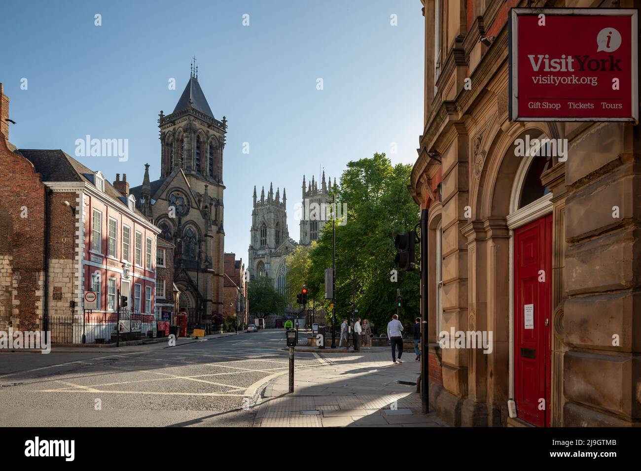 Spring morning in York city centre, England. York Oratory and Minster in the distance. Stock Photo