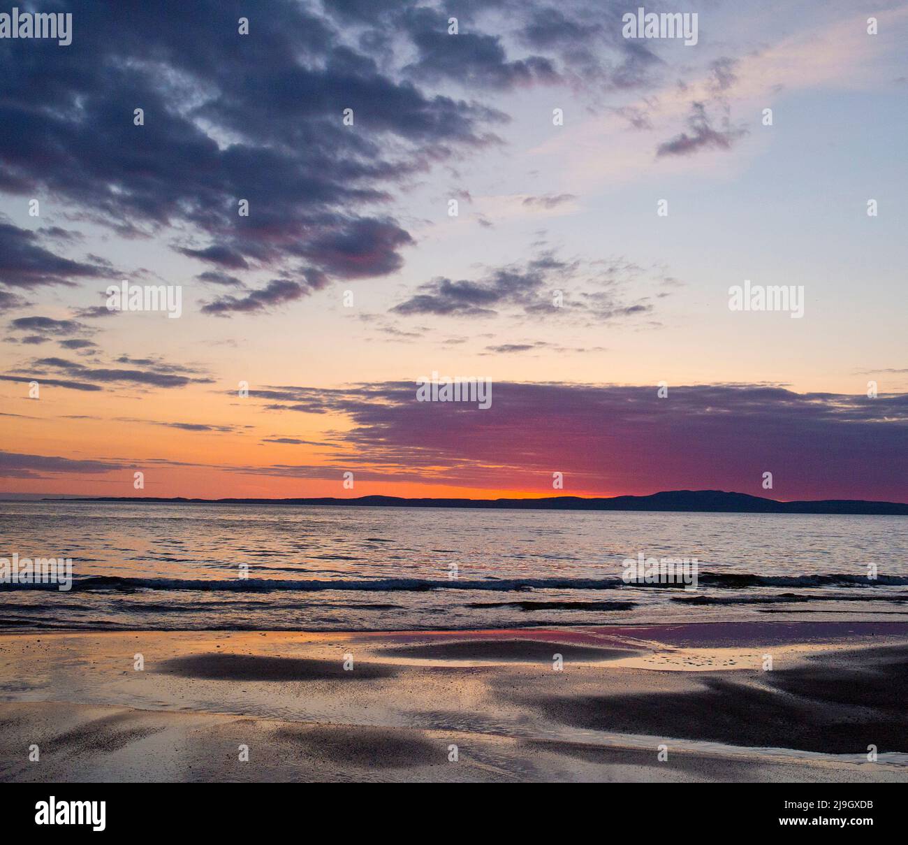 Sunset on Kintra beach, Islay, Inner Hebrides, Scotland Stock Photo